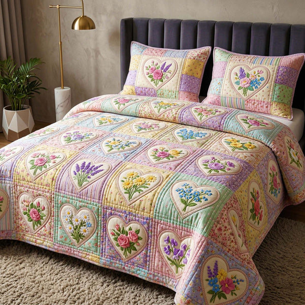 Pastel Heart quilted 3-piece bedding set on a made bed with two matching pillow shams