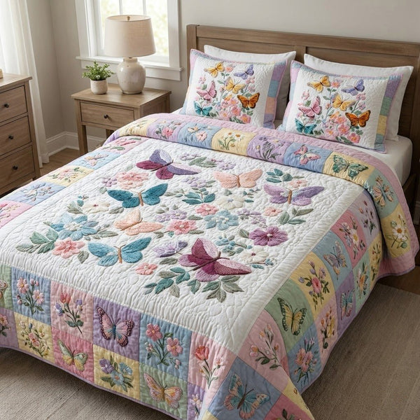 Pastel Parade quilted 3-piece bedding set on a made bed with two matching pillow shams