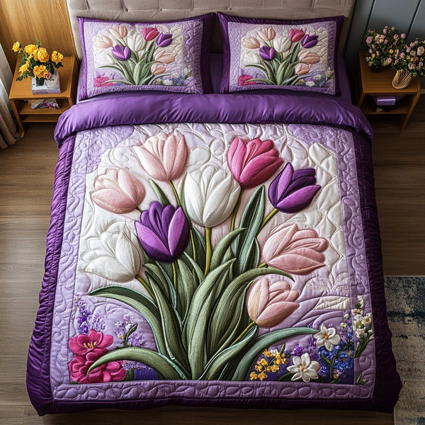 Pastel Petals quilted 3-piece bedding set on a made bed with two matching pillow shams