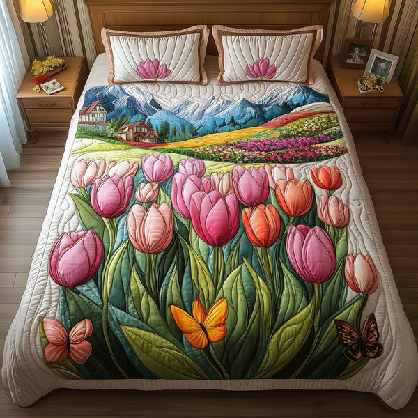 Pastel Tulip Dreams quilted 3-piece bedding set on a made bed with two matching pillow shams