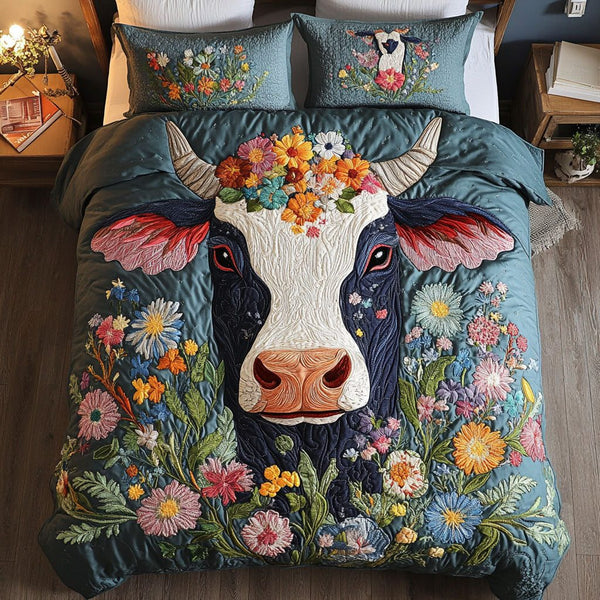 Pastoral Beauty quilted 3-piece bedding set on a made bed with two matching pillow shams