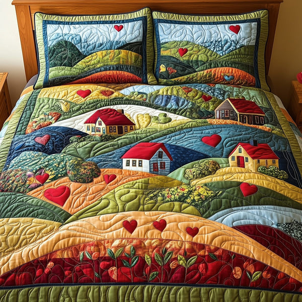 Pastoral Dreams quilted 3-piece bedding set on a made bed with two matching pillow shams