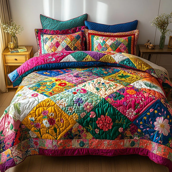 Patch Bloom quilted 3-piece bedding set on a made bed with two matching pillow shams