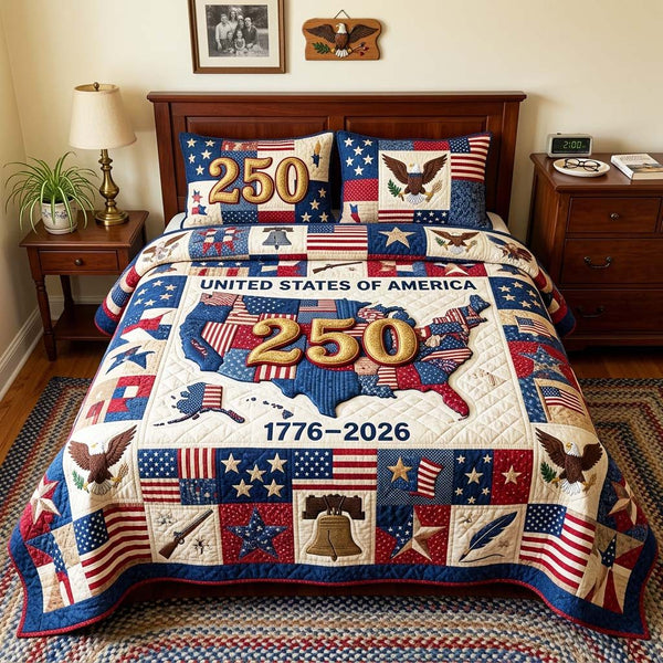 Patch Star quilted 3-piece bedding set on a made bed with two matching pillow shams