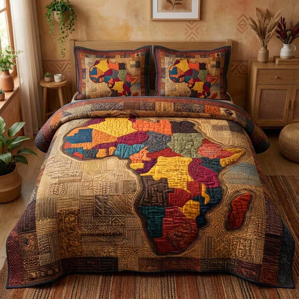 Patchwork Africa quilted 3-piece bedding set on a made bed in a farmhouse bedroom