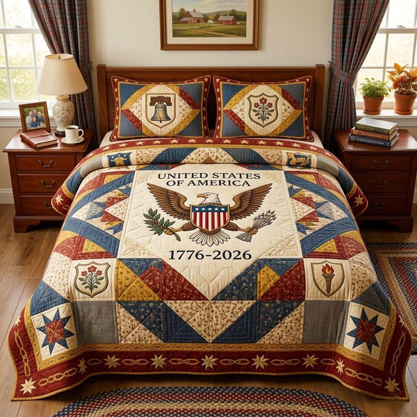 Patchwork Eagle quilted 3-piece bedding set on a made bed in a warmly lit bedroom