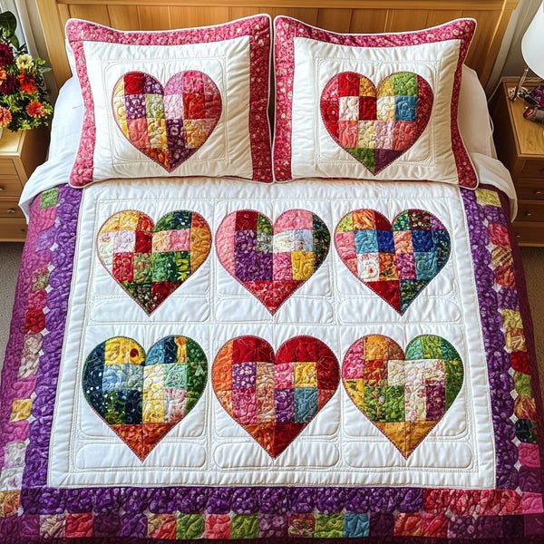 Patchwork Hearts quilted 3-piece bedding set on a made bed in a farmhouse bedroom
