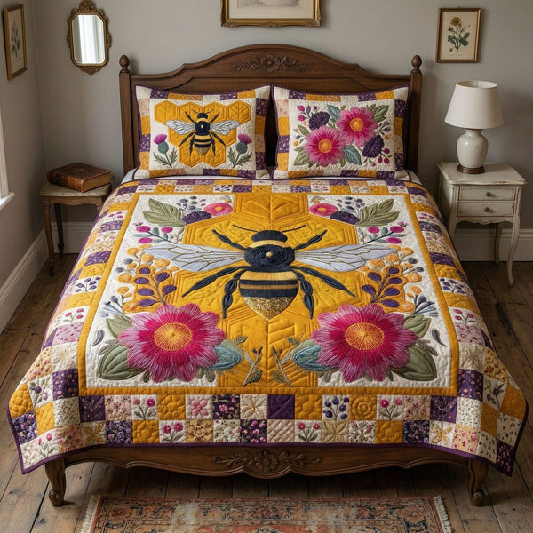 Patchwork Pollinator quilted 3-piece bedding set on a made bed in a farmhouse bedroom