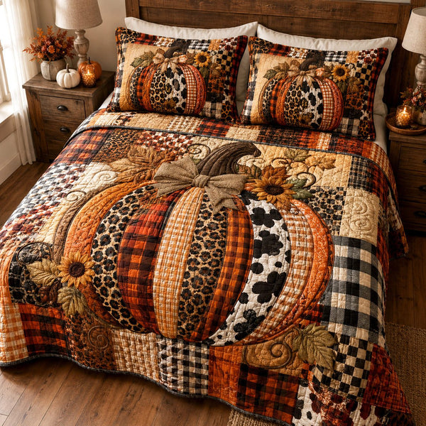Patchwork Pumpkin quilted 3-piece bedding set on a made bed against a dark styled interior