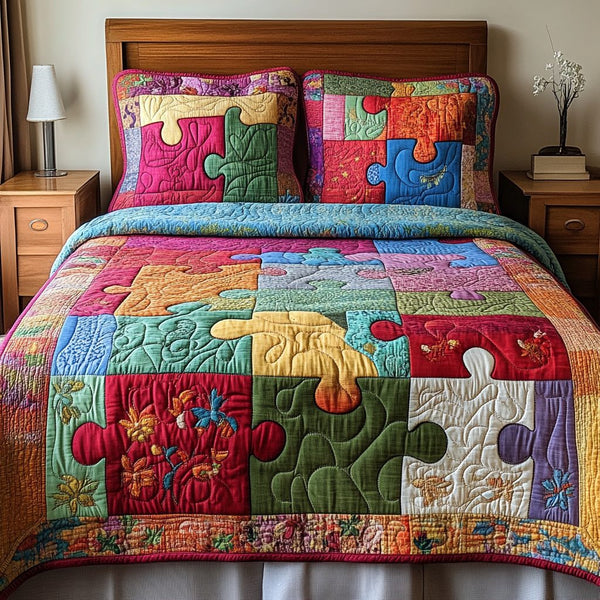 Patchwork Puzzle Quilt quilted 3-piece bedding set on a made bed in a farmhouse bedroom