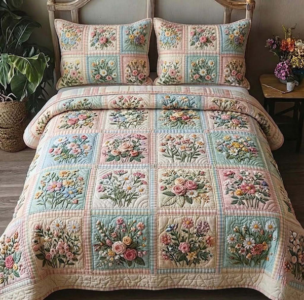 Patchy Bloom quilted 3-piece bedding set on a made bed with two matching pillow shams