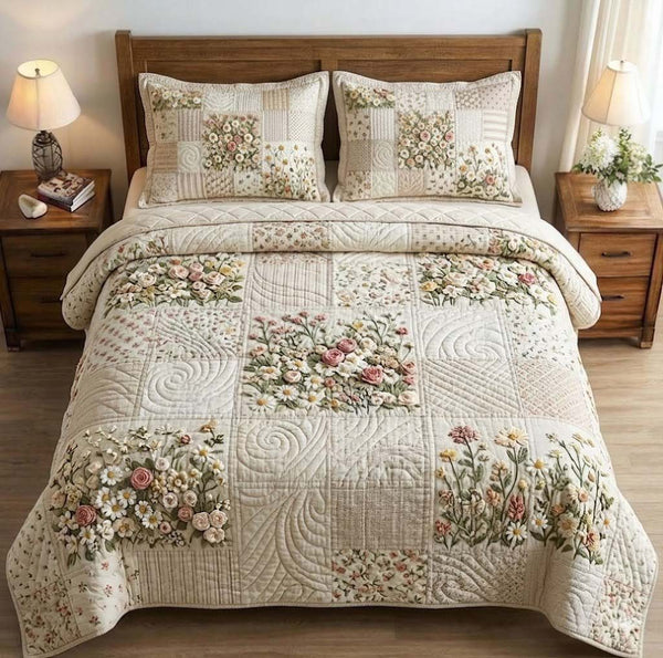 Patchy Bloom quilted 3-piece bedding set on a made bed with two matching pillow shams