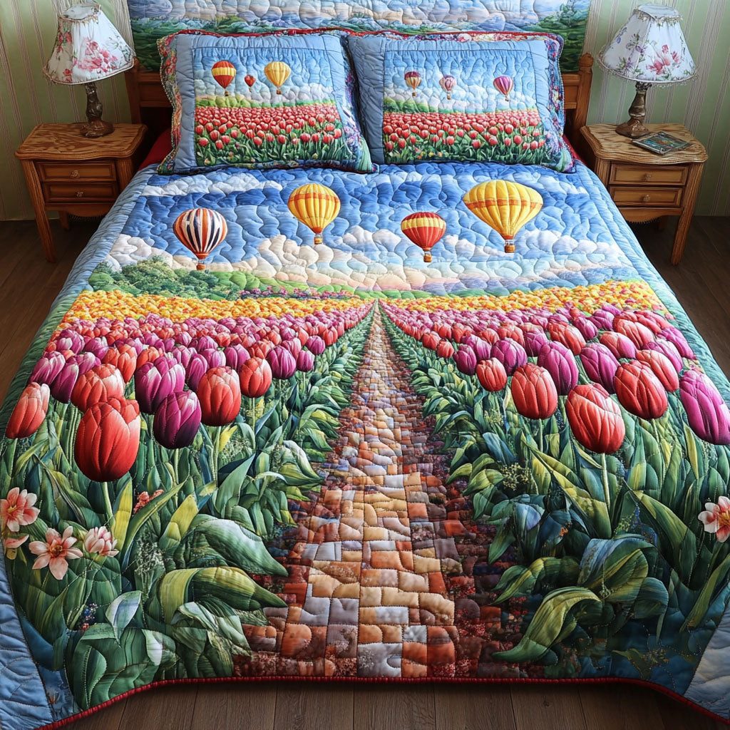 Path of Petals quilted 3-piece bedding set on a made bed with two matching pillow shams