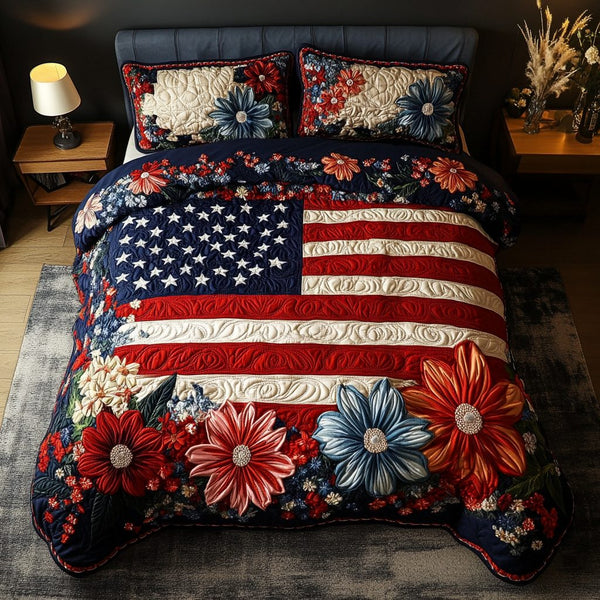 Patriot Bloom quilted 3-piece bedding set on a made bed in a warmly lit bedroom