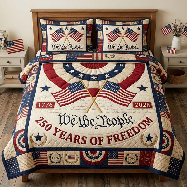 Patriot Bunting quilted 3-piece bedding set on a made bed in a warmly lit bedroom