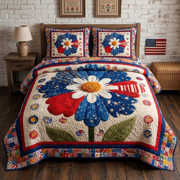 Patriot Daisy quilted 3-piece bedding set on a made bed in a warmly lit bedroom