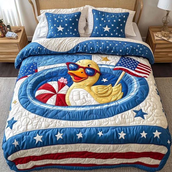 Patriot Duckie quilted 3-piece bedding set on a made bed in a warmly lit bedroom