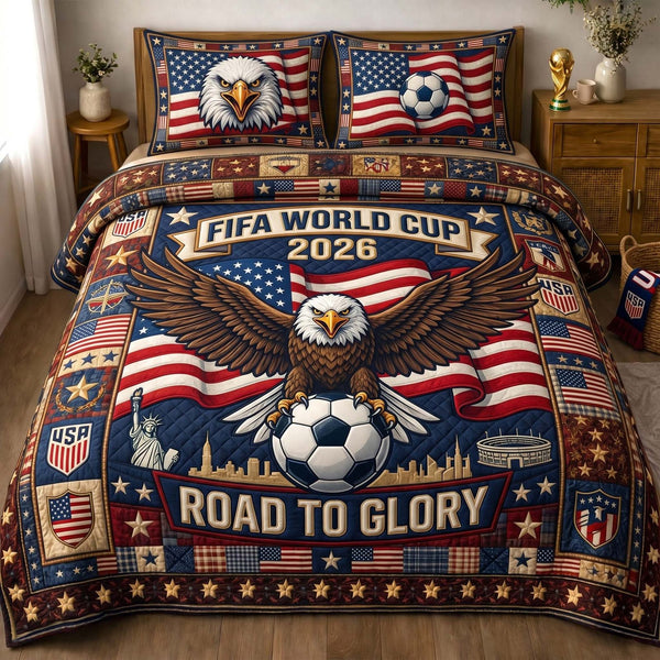 Patriot Eagle Cup quilted 3-piece bedding set on a made bed in a warmly lit bedroom