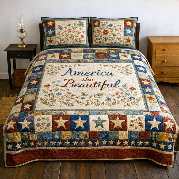 Patriot Glory quilted 3-piece bedding set on a made bed in a warmly lit bedroom