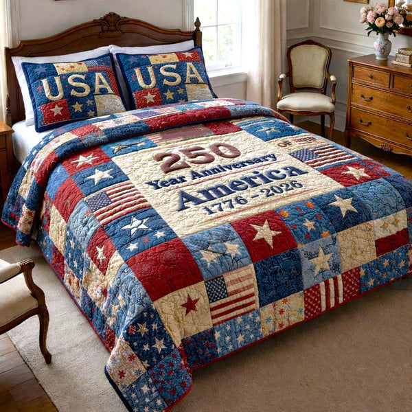 Patriot Palette quilted 3-piece bedding set on a made bed in a warmly lit bedroom
