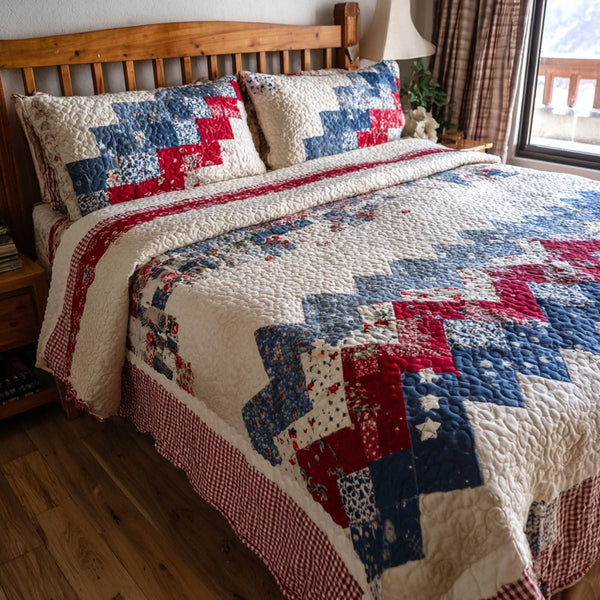 Patriot Pride quilted 3-piece bedding set on a made bed in a warmly lit bedroom