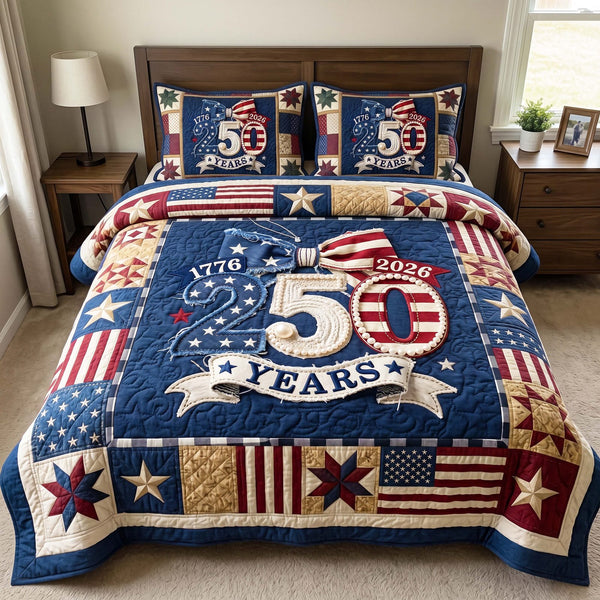 Patriot Quartermill quilted 3-piece bedding set on a made bed in a warmly lit bedroom