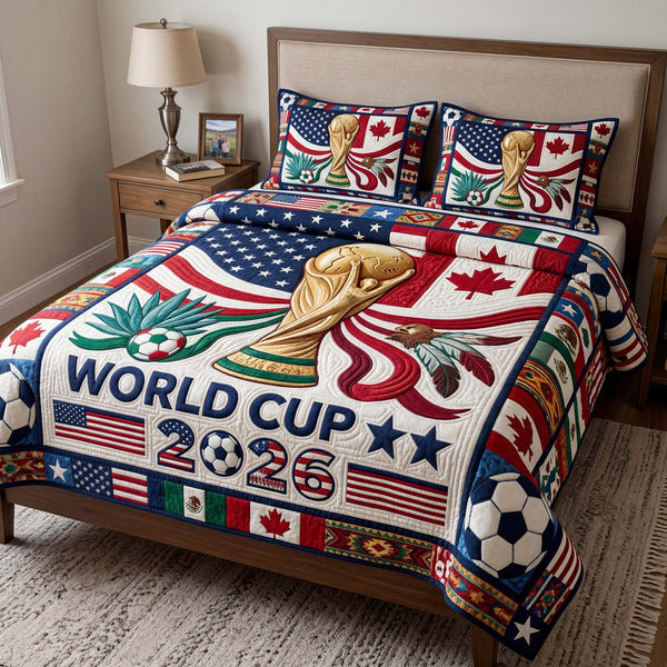 Patriot Trophy quilted 3-piece bedding set on a made bed in a warmly lit bedroom
