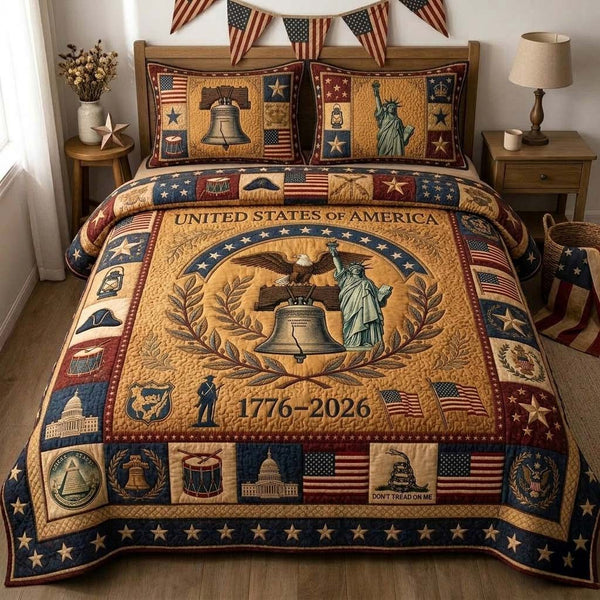 Patriot Unity Emblem quilted 3-piece bedding set on a made bed in a warmly lit bedroom