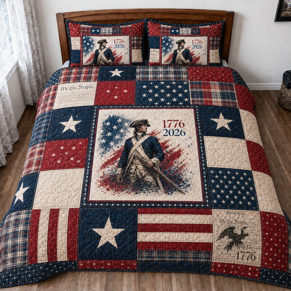 Patriotic Americana quilted 3-piece bedding set on a made bed in a warmly lit bedroom