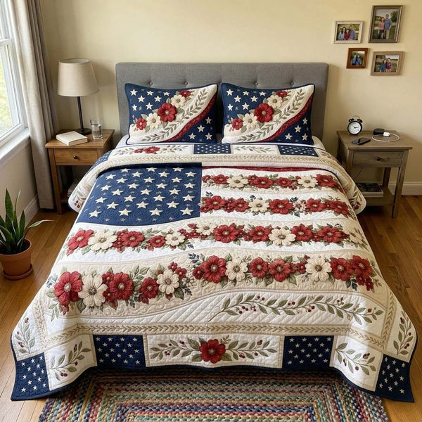 Patriotic Bloom quilted 3-piece bedding set on a made bed in a warmly lit bedroom