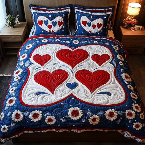 Patriotic Blossom Symphony quilted 3-piece bedding set on a made bed in a warmly lit bedroom