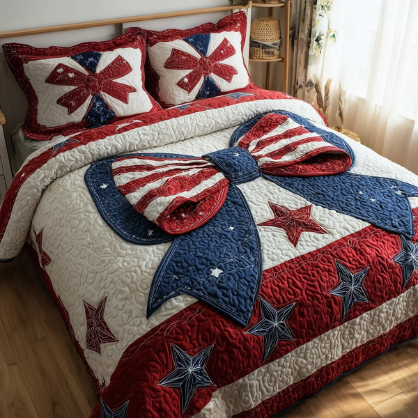Patriotic Bow quilted 3-piece bedding set on a made bed in a warmly lit bedroom