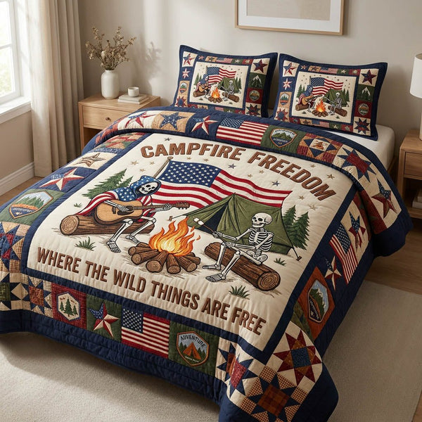 Patriotic Campfire quilted 3-piece bedding set on a made bed in a warmly lit bedroom