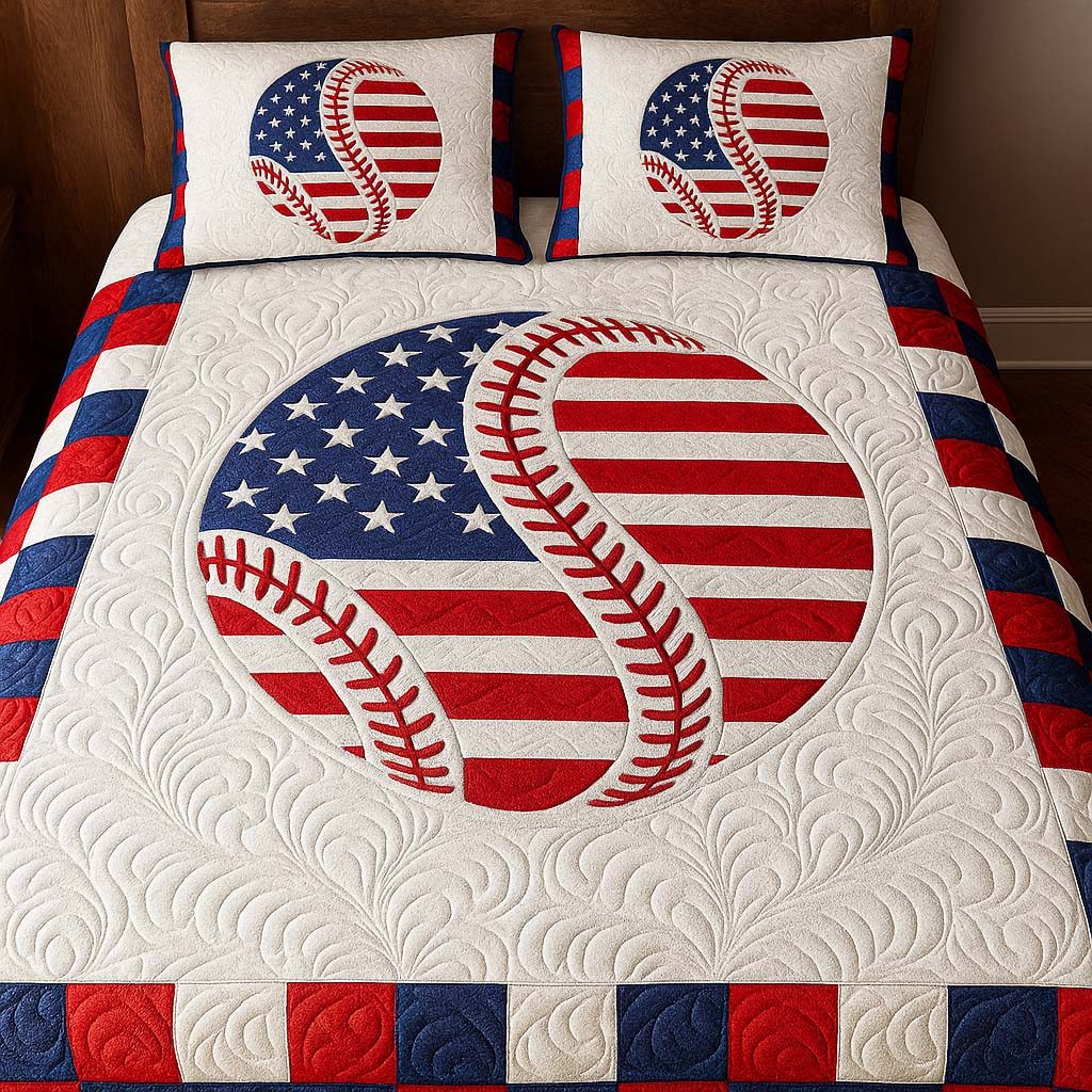 Patriotic Curveball quilted 3-piece bedding set on a made bed in a warmly lit bedroom