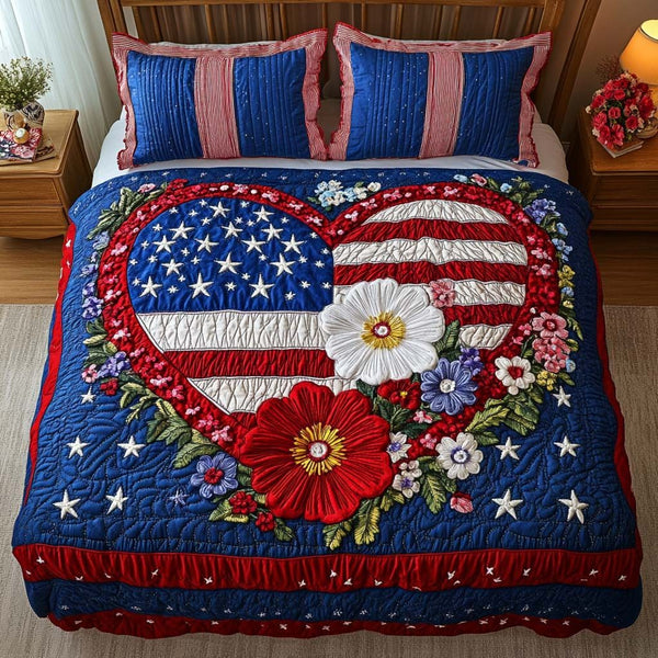 Patriotic Garden quilted 3-piece bedding set on a made bed in a warmly lit bedroom