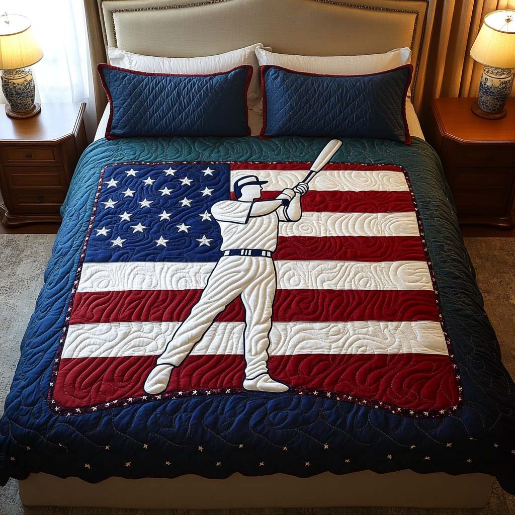 Patriotic Home Run quilted 3-piece bedding set on a made bed in a warmly lit bedroom