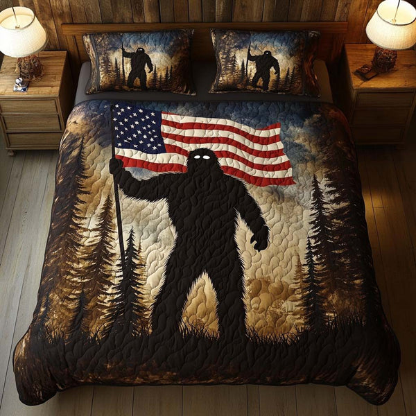 Patriotic Legend quilted 3-piece bedding set on a made bed in a warmly lit bedroom