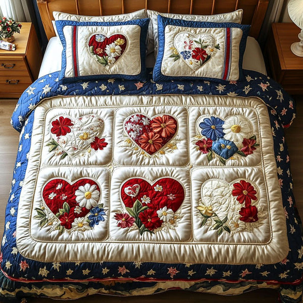 Patriotic Petals quilted 3-piece bedding set on a made bed in a warmly lit bedroom