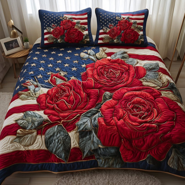 Patriotic Rose quilted 3-piece bedding set on a made bed in a warmly lit bedroom