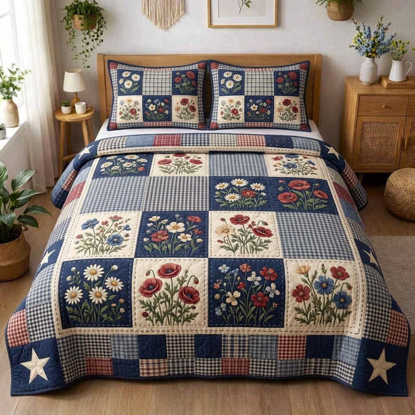 Patriotic Wildflower quilted 3-piece bedding set on a made bed in a warmly lit bedroom