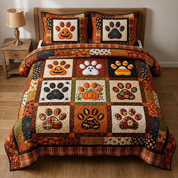 Paw Print quilted 3-piece bedding set on a made bed with two matching pillow shams