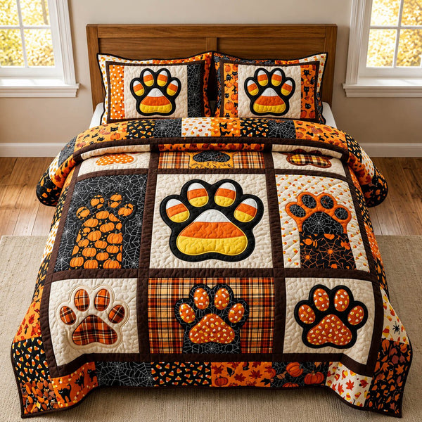 Paw Print quilted 3-piece bedding set on a made bed with two matching pillow shams
