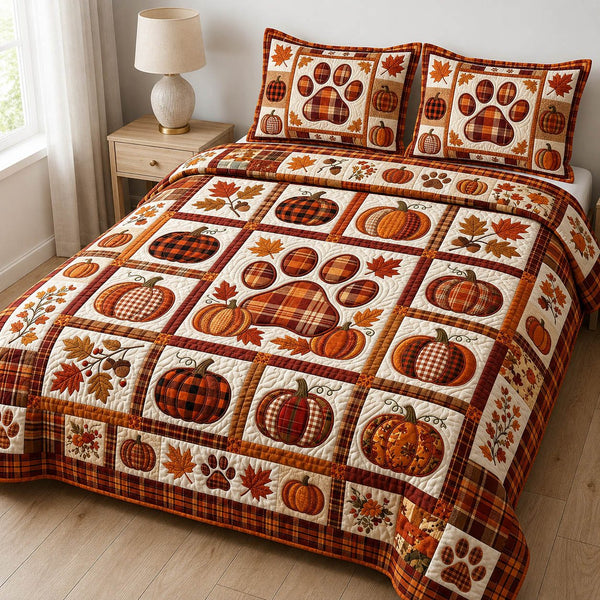 Paw Print quilted 3-piece bedding set on a made bed with two matching pillow shams
