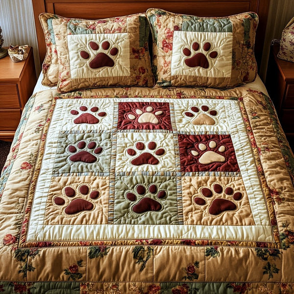 Paw Squares quilted 3-piece bedding set on a made bed with two matching pillow shams