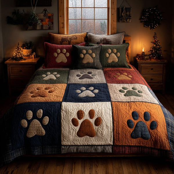 Pawprint Meadow quilted 3-piece bedding set on a made bed with two matching pillow shams