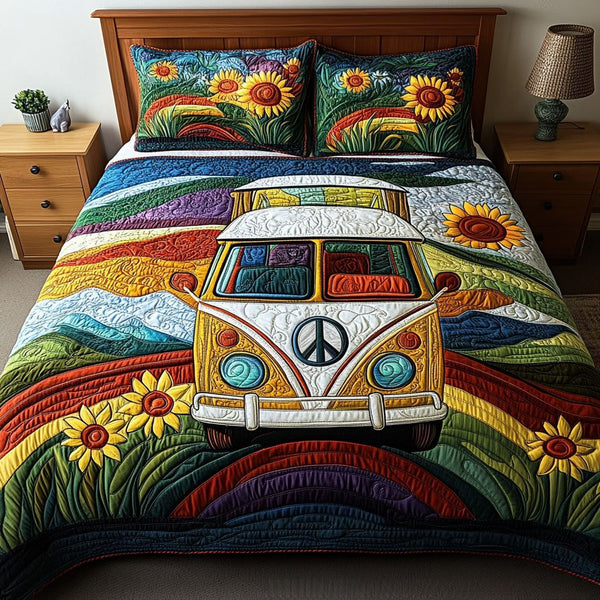 Peace and Wheels quilted 3-piece bedding set on a made bed with two matching pillow shams