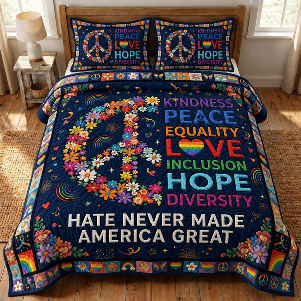 Peace Love Equality quilted 3-piece bedding set on a made bed with two matching pillow shams