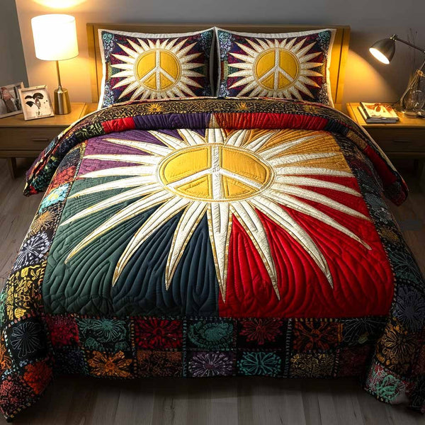 Peace Vibes quilted 3-piece bedding set on a made bed with two matching pillow shams