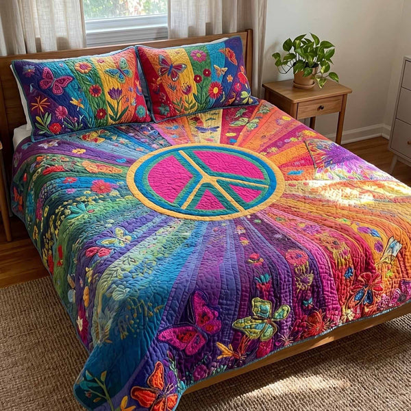 Peaceful Bloom quilted 3-piece bedding set on a made bed with two matching pillow shams