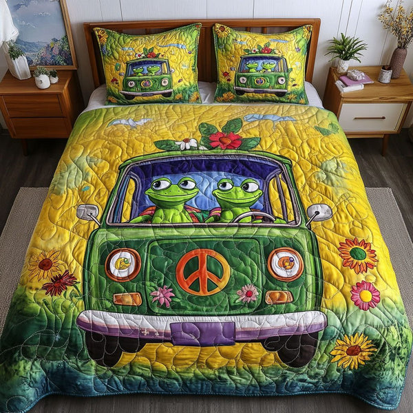 Peaceful Hoppers quilted 3-piece bedding set on a made bed with two matching pillow shams